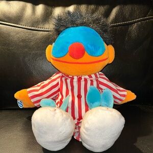 Sing and snore Ernie Striped Pajama Plush Toy with Blue and Orange Details